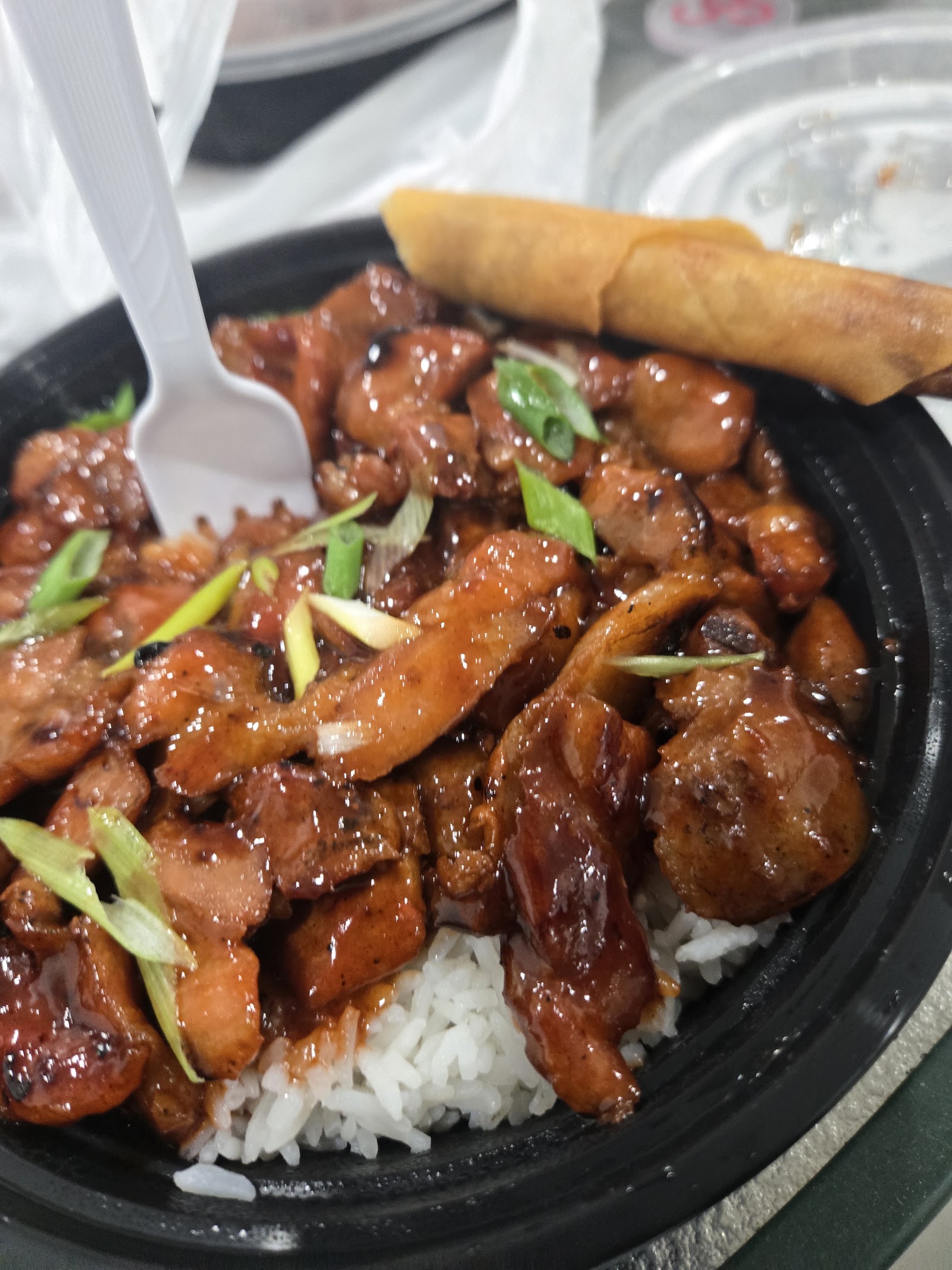 Plated rice bowl with grilled meat